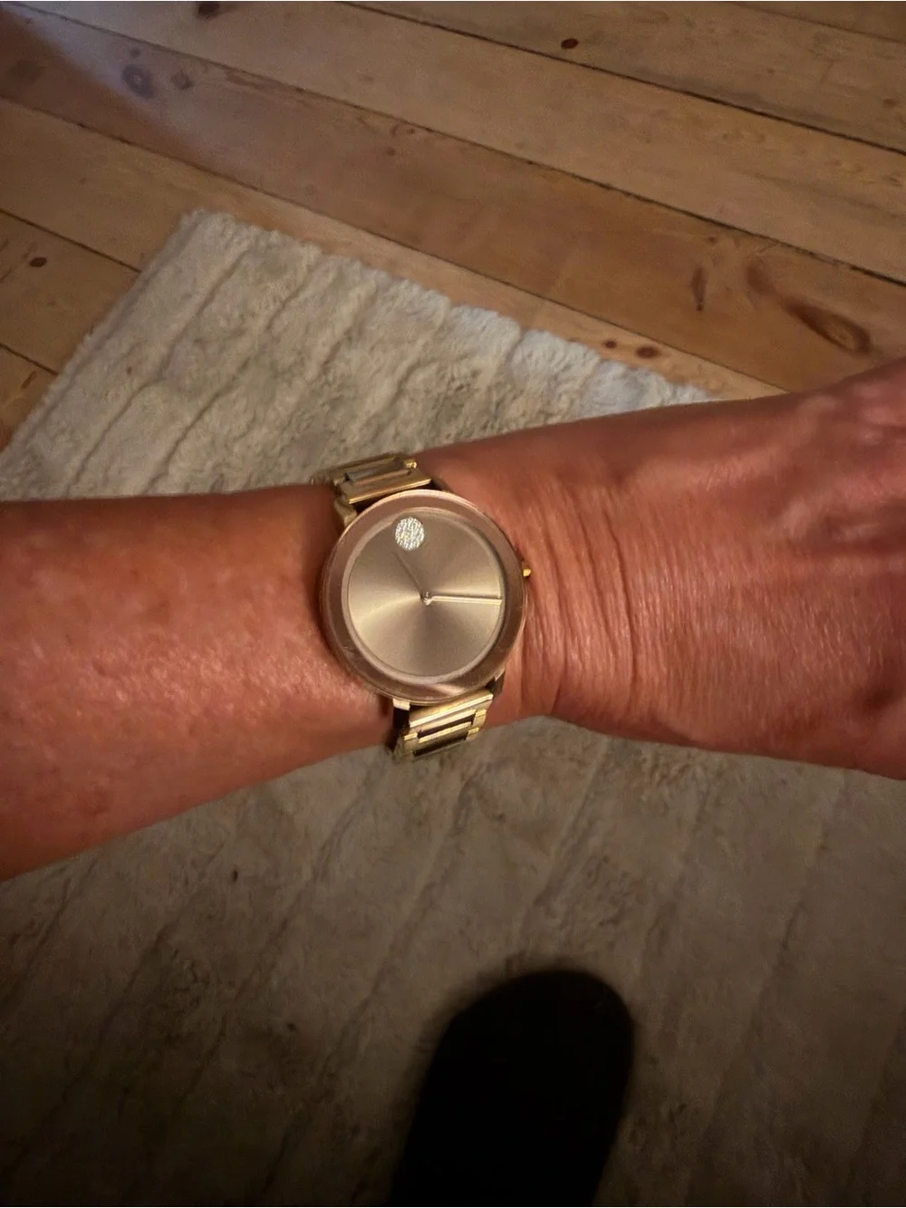 Movado Rose Gold Minimalist Bracelet Watch with a diamond